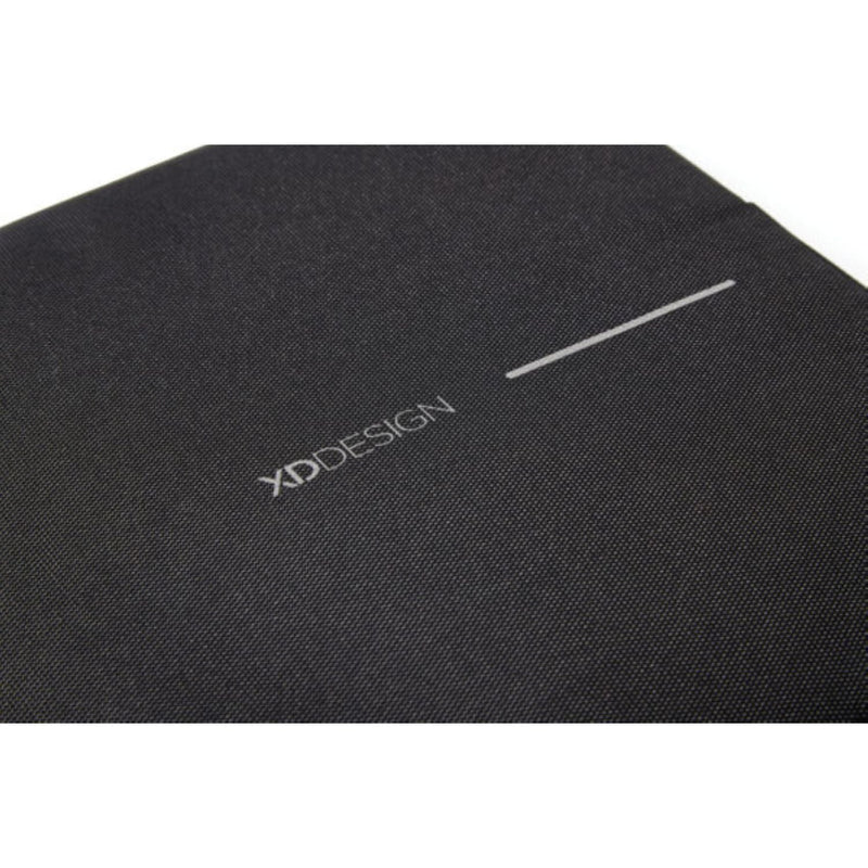 Bobby laptop sleeve sliding into a bag
