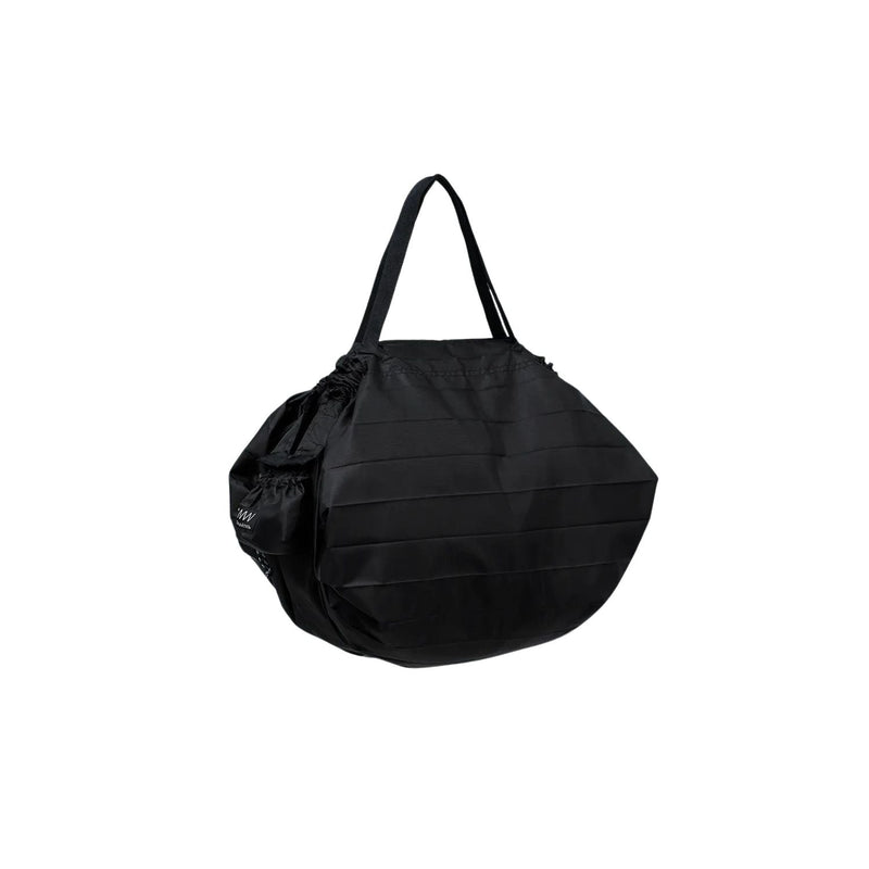 Shupatto packable bag showing the integrated drawstring pouch