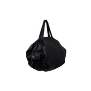 Shupatto packable bag folded away into its pouch